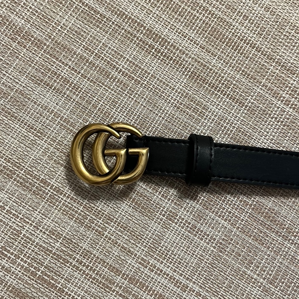 Black Gucci belt. Thin. 44 inches long.